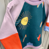Sweater | Our everyday companion Rainbow Lilac/Orange
