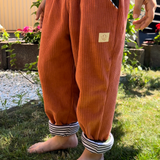 Ino children's trousers | Organic corduroy | Orange Green