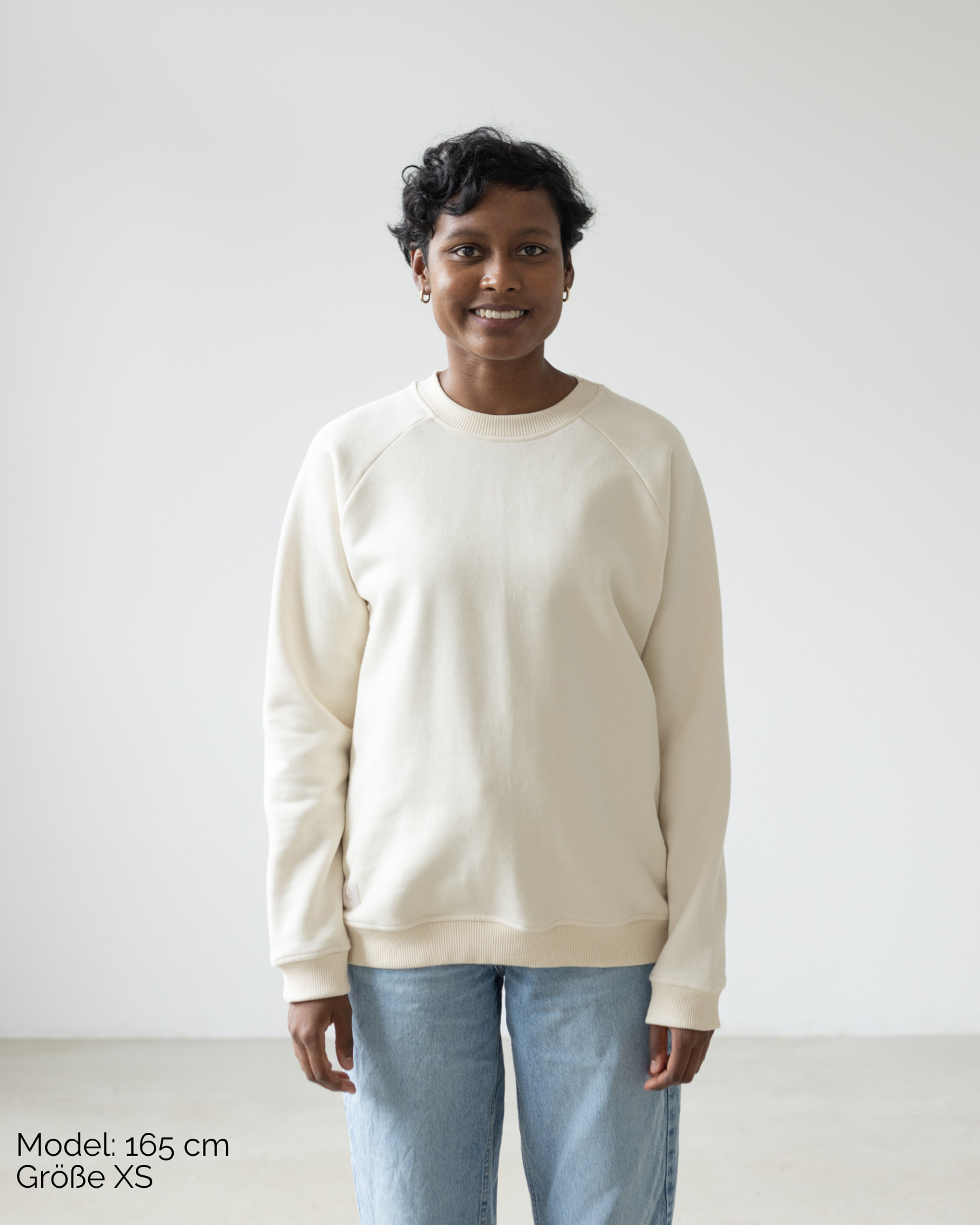 Fairer Kuschelpullover aus Bio-Baumwolle in Weiß im Unisex-Schnitt von der Marke Oktopulli