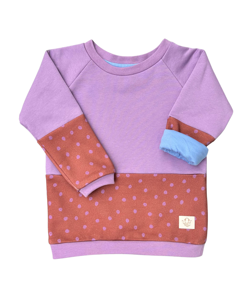 Special children's clothing | Limited edition lilac and polka dots | Cozy sweater that grows with your child