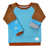 Mitwachsender warmer Pullover Kinder | Bio Baumwolle | Hellblau braun Häschen