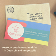 Bunte Geschenkgutscheinkarte und Briefumschlag